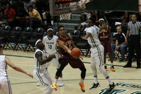 Junior guar Jalen Gray drives to the hoop for a missed layup against Tulane University in the Devlin Field House. The Pack lost to the Green Wave