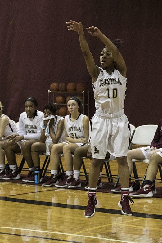 Sophomore guard Zoie Miller shoots a three from the corner in the third quarter of a game against Blue Mountain College in the Den. Miller finished the game with a career-high 22 points in a 95-57 victory.